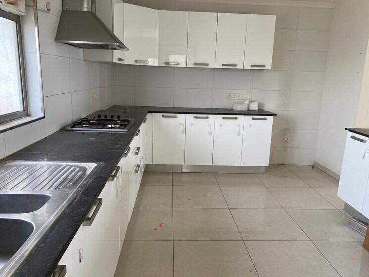 Kitchen, tata-raheja-raisina-residency 4 Bedroom 3829 Sq.Ft. Apartment In Sector 59 Gurgaon 9431671