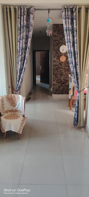 Living Room in 4 BHK Apartment at Ansal API Victoria Floors, Dhakoli – for Sale