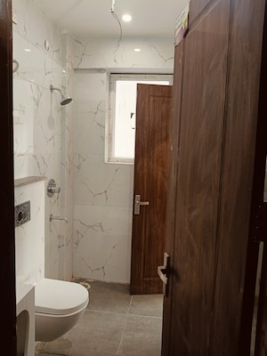 Bathroom in 3 BHK Builder Floor at Dhakoli – for Sale