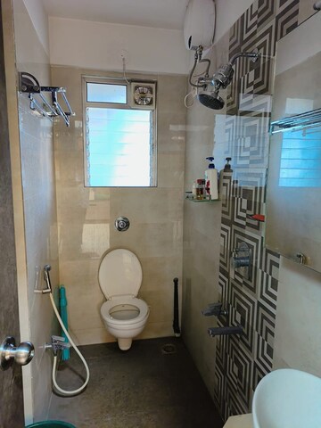 Bathroom in 1 BHK Apartment at Strawberry The Address, Mira Road East – for Rent