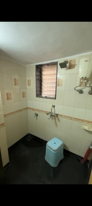 Bathroom in 1 BHK Apartment at Dwarkesh Dham, Borivali West – for Rent