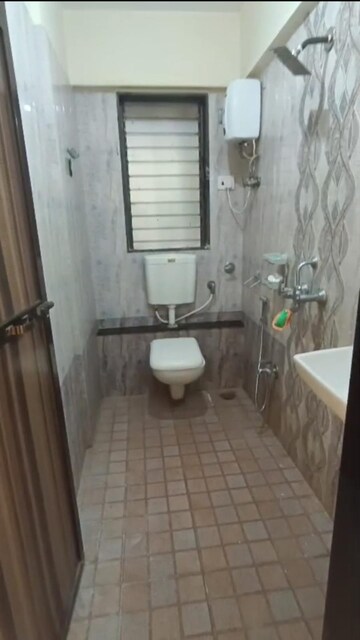 Bathroom in 1 BHK Apartment at Rashmi Chhaya CHS, Kandivali West – for Rent