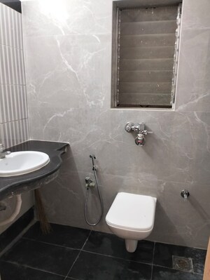 Bathroom in 1 BHK Apartment at RNA Regency Park, Kandivali West – for Rent
