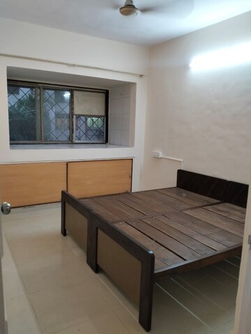 Bedroom in 1 BHK Apartment at RNA Regency Park, Kandivali West – for Rent