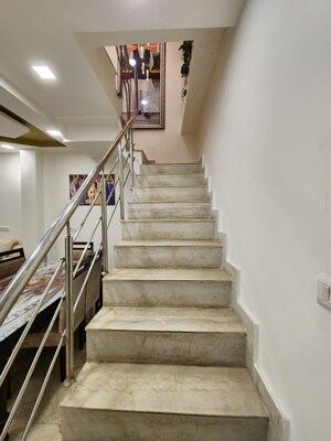 Staircase in 4 BHK Builder Floor at Malviya Nagar – for Sale