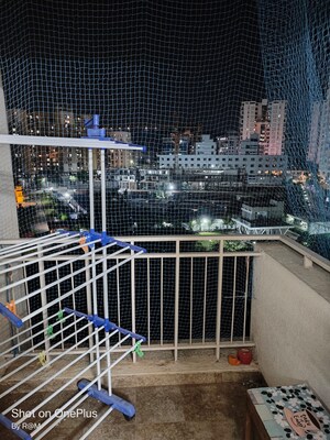 Balcony in 2 BHK Apartment at Abhinav Pebbles Urbania, Bavdhan – for Rent