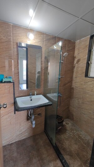 Bathroom in 2 BHK Apartment at Abhinav Pebbles Urbania, Bavdhan – for Rent