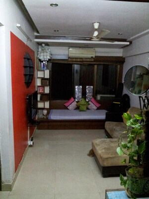 Living Room in 1 BHK Apartment at Amisha Apartments, Kandivali West – for Rent