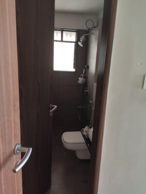 Bathroom in 3 BHK Apartment at Kohinoor Courtyard One, Wakad – for Rent