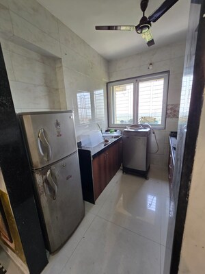 Kitchen in 3 BHK Apartment at Shanti Green Palms, Ghansoli – for Rent