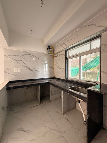 Kitchen in 2 BHK Apartment at Vraj Gateway Aparna CHS, Borivali West – for Rent