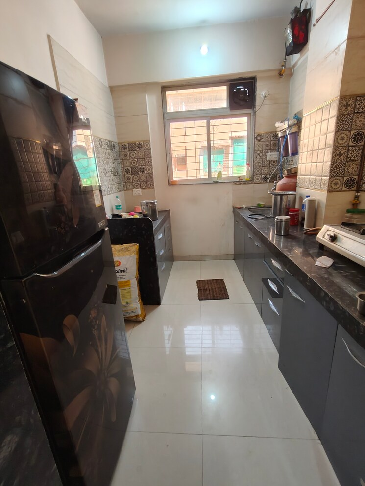 Kitchen, patel-ram-ambar 2 Bedroom 1000 Sq.Ft. Apartment In Ambernath East Thane 9434023