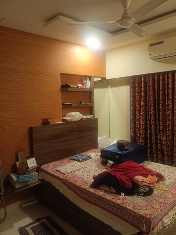 Bedroom in 2 BHK Apartment at Romell Umiya Grandeur, Goregaon East – for Rent