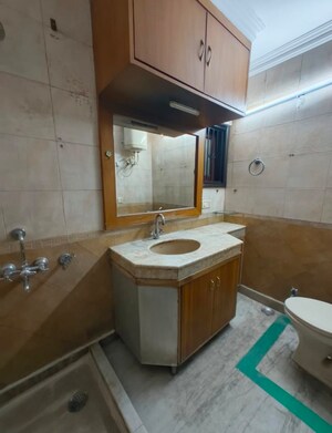 Bathroom in 3.5 BHK Builder Floor at Kalkaji – for Rent