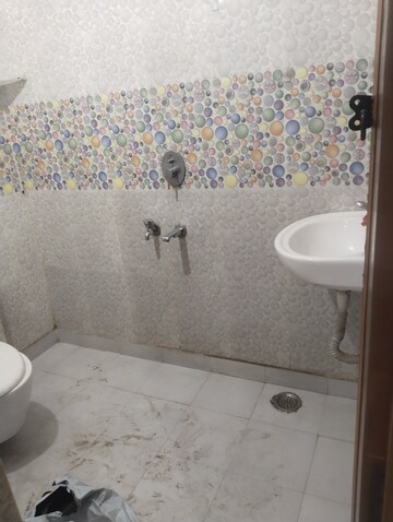 Bathroom in 4 BHK Builder Floor at Dwarka Mor – for Sale