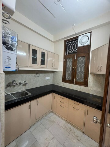 Kitchen in 2 BHK Apartment at Khirki Extension – for Rent