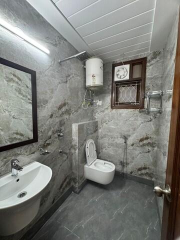 Bathroom in 2 BHK Apartment at Khirki Extension – for Rent