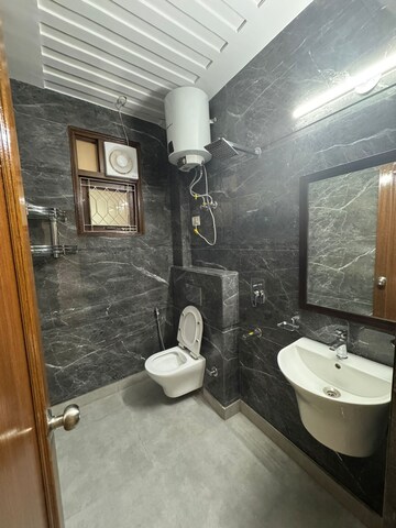 Bathroom in 2 BHK Apartment at Khirki Extension – for Sale