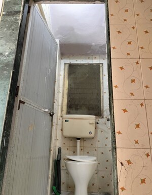 Bathroom in 2 BHK Apartment at Geeta Abhas CHS, Mira Road – for Rent