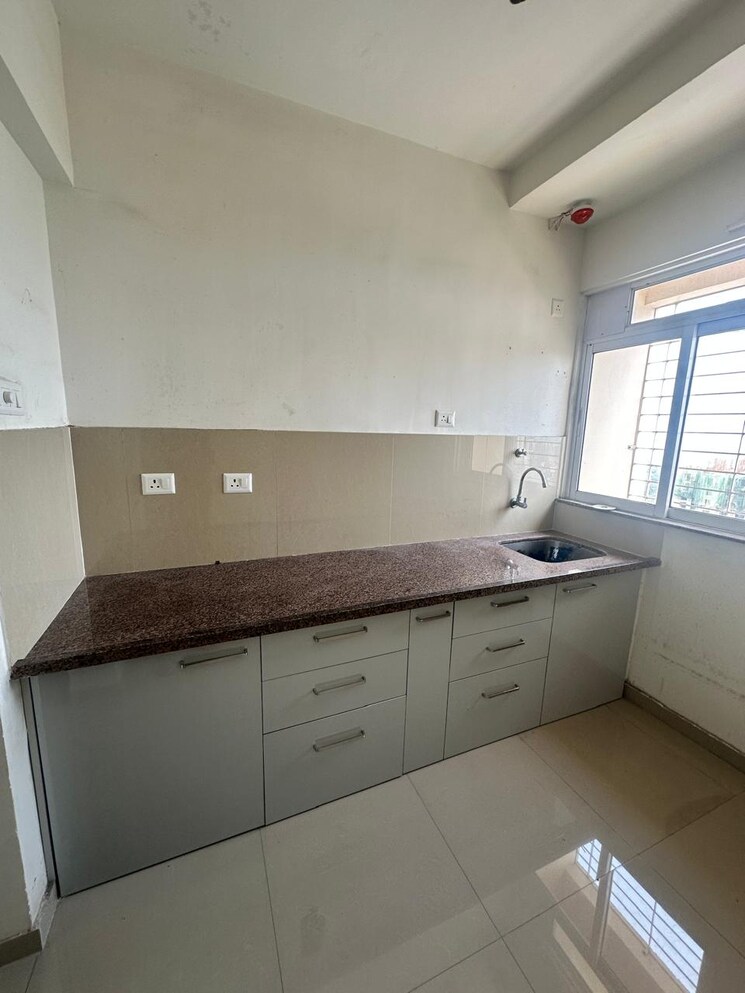Kitchen, raunak-heights 1 Bedroom 405 Sq.Ft. Apartment In Ghodbunder Road Thane 9435155