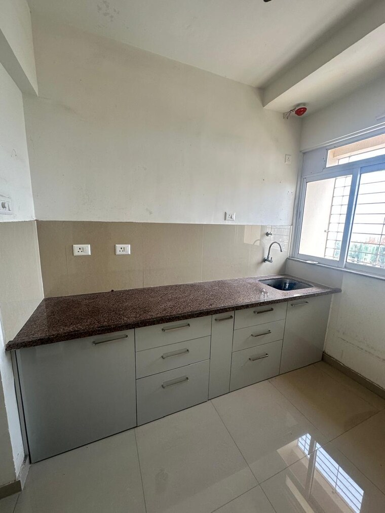 Kitchen, raunak-heights 1 Bedroom 405 Sq.Ft. Apartment In Ghodbunder Road Thane 9435155