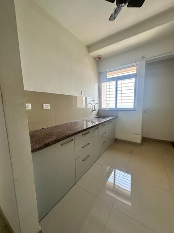 Kitchen in 1 BHK Apartment at Raunak Heights, Ghodbunder Road – for Rent