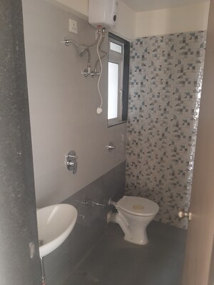 Bathroom in 1 BHK Apartment at Raunak Heights, Ghodbunder Road – for Rent