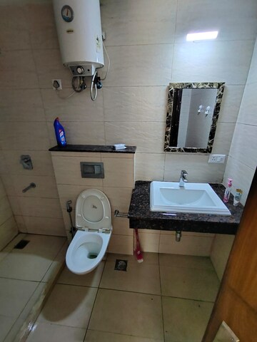 Bathroom in 1 BHK Apartment at Auric City Homes, Sector 82 – for Sale