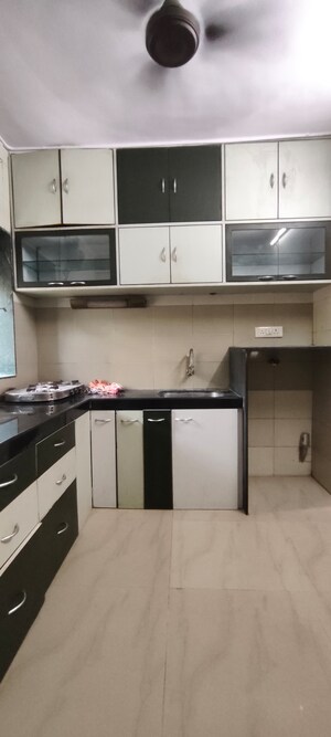 Kitchen in 1 BHK Apartment at Shreeji Tower CHS, Uthalsar – for Rent