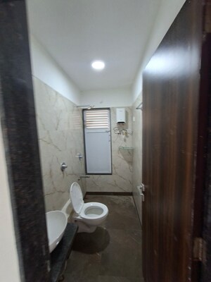Bathroom in 1 BHK Apartment at Cosmos 27 Gbr, Kasarvadavali – for Rent