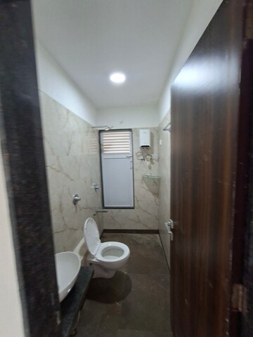 Bathroom in 1 BHK Apartment at Cosmos 27 Gbr, Kasarvadavali – for Rent