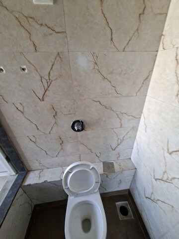 Bathroom in 1 BHK Apartment at Vihang Valley Phase 3, Kasarvadavali – for Rent