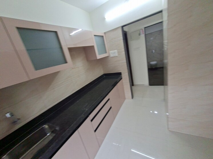 Kitchen, shri-siddhivinayak-chs-haware 1 Bedroom 560 Sq.Ft. Apartment In Haware City Thane 9435304