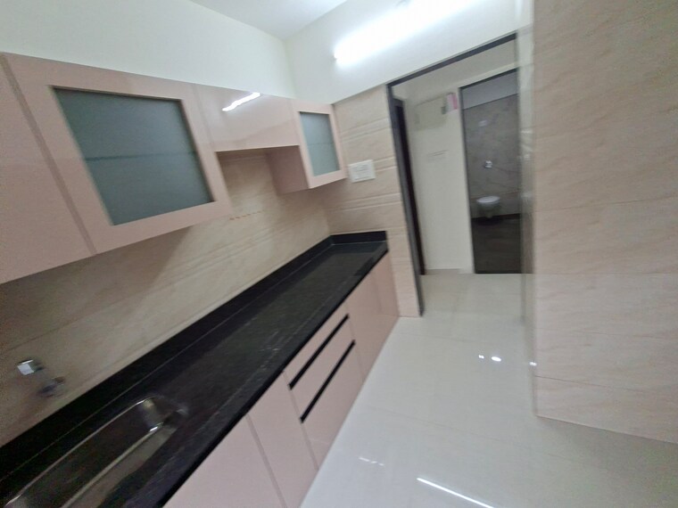 Kitchen, shri-siddhivinayak-chs-haware 1 Bedroom 560 Sq.Ft. Apartment In Haware City Thane 9435304