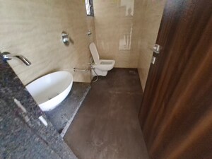 Bathroom in 1 BHK Apartment at Shri Siddhivinayak CHS Haware, Haware City – for Rent