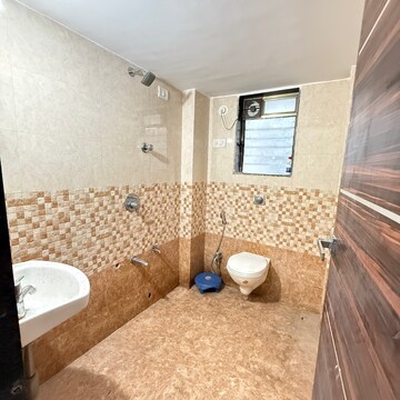 Bathroom in 2 BHK Apartment at Vedant Sumeet Elegance 360, Manpada – for Rent
