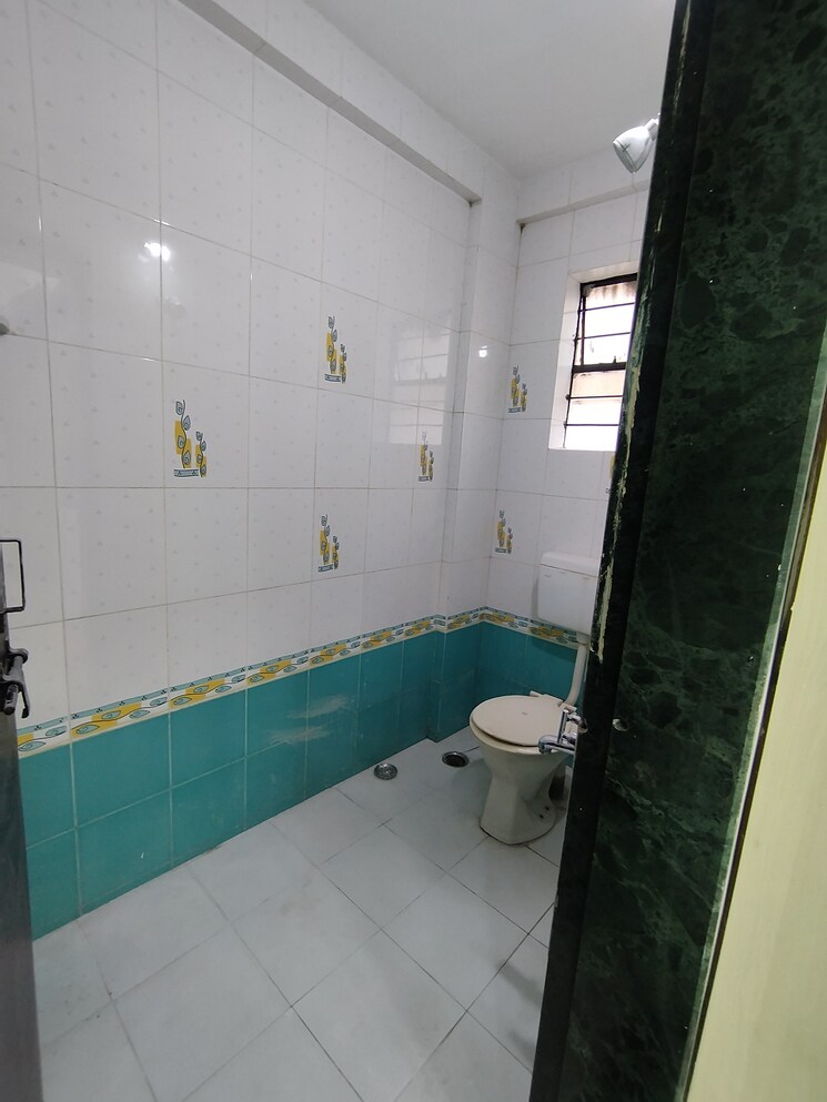 Bathroom, atharv-vihar 2 Bedroom 850 Sq.Ft. Apartment In Pimple Gurav Pune 9435525
