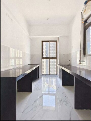 Kitchen in 2 BHK Apartment at Raymond Ten X Habitat, Pokhran Road No Two – for Rent