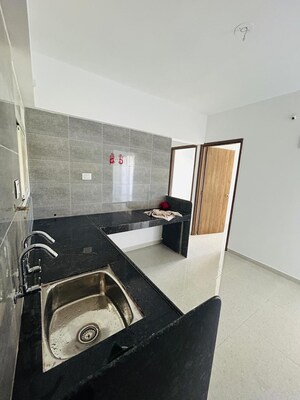 Kitchen in 2 BHK Apartment at Atria Dhanashree Aanand 2, Handewadi – for Rent