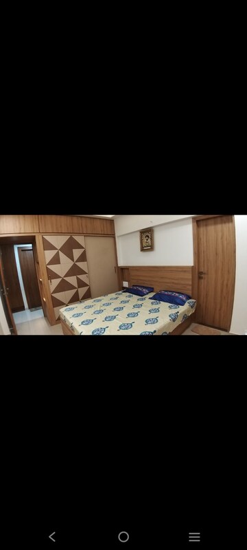 Bedroom in 3 BHK Penthouse at HN Safal Orchid Harmony, Shela – for Rent