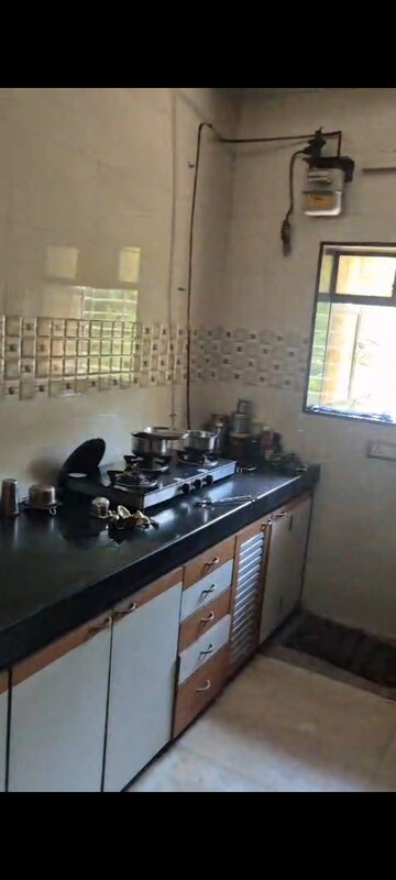 Kitchen in 2 BHK Apartment at Daya Sagar CHSL, Goregaon East – for Rent