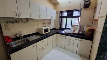 Kitchen in 2 BHK Apartment at Planet Powai CHS, Powai – for Rent