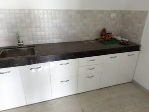 Kitchen in 2 BHK Apartment at Mittal High Mont, Hinjewadi – for Rent