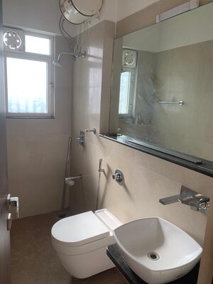 Bathroom in 2 BHK Apartment at Omkar Meridia, Kurla West – for Rent
