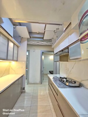Kitchen in 3 BHK Apartment at Gaur City 2 - 14th Avenue, Sector 16c Greater Noida – for Rent