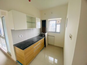 Kitchen in 1 BHK Apartment at Omkar Signet, Malad East – for Rent