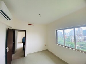 Room in 1 BHK Apartment at Omkar Signet, Malad East – for Rent