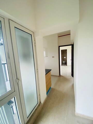 Building Lobby in 1 BHK Apartment at Omkar Signet, Malad East – for Rent