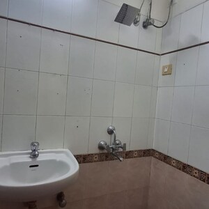 Bathroom in 2 BHK Apartment at Sheth Vasant Marvel, Devala Pada – for Rent