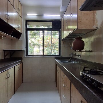 Kitchen in 2 BHK Apartment at Sheth Vasant Marvel, Devala Pada – for Rent